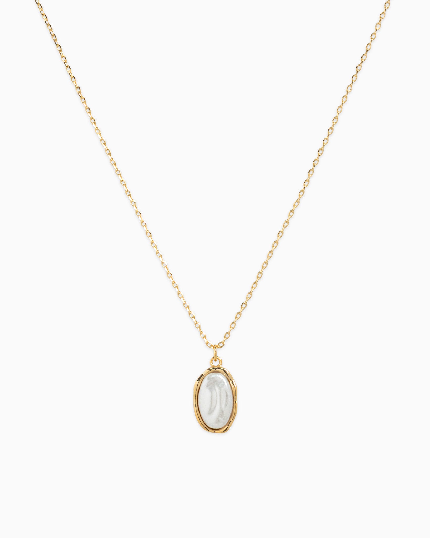 Gold necklace with a pendant on a white background