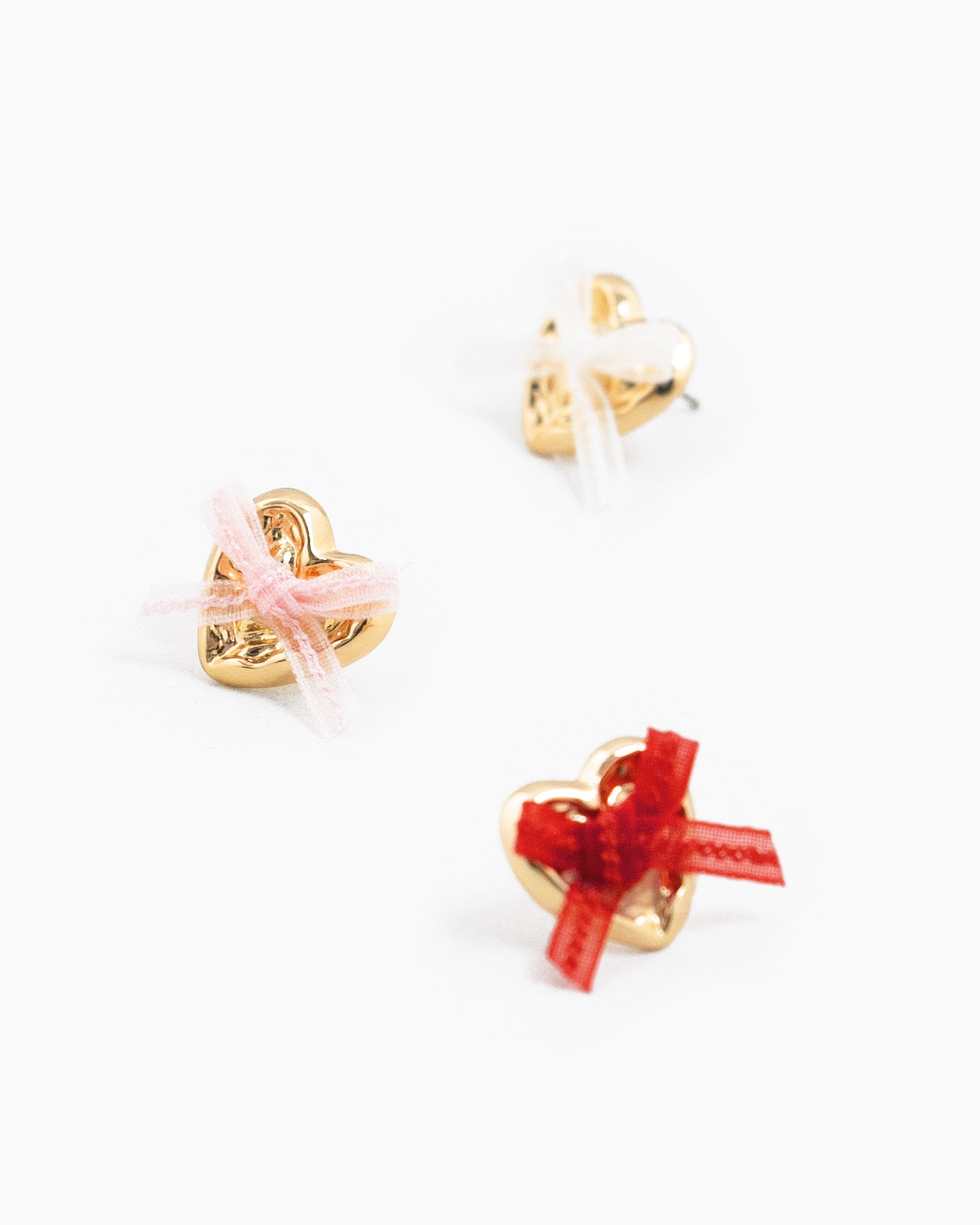 Gold Heart Lace Bow Valentine Earrings – styled view