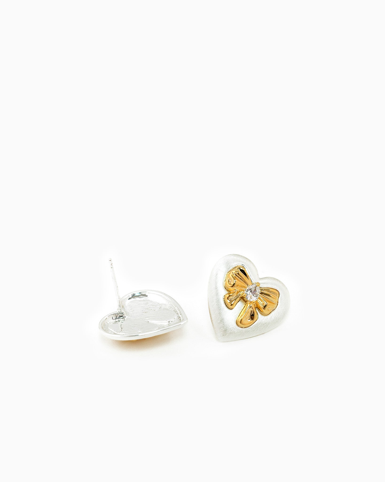 Two-Tone Brushed Puff Heart Adorned Bow Earrings