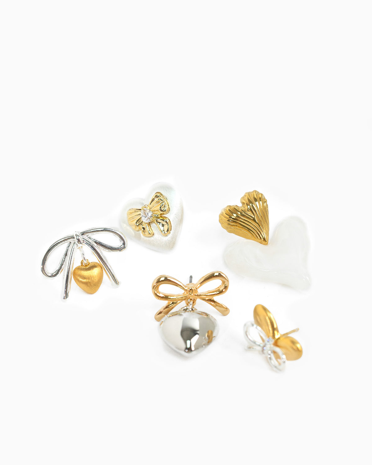Two-Tone Brushed Puff Heart Adorned Bow Earrings