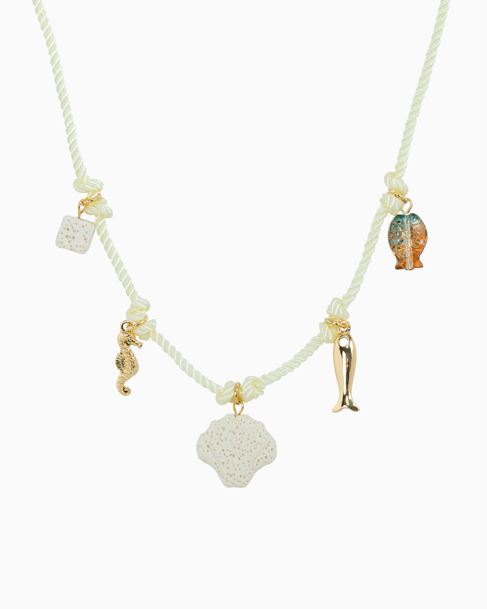 Necklace with various charms including a shell, fish, and seahorse