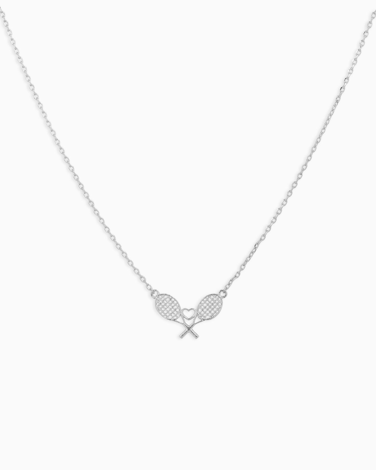 Open tennis racket pair w/ heart pendant necklace
