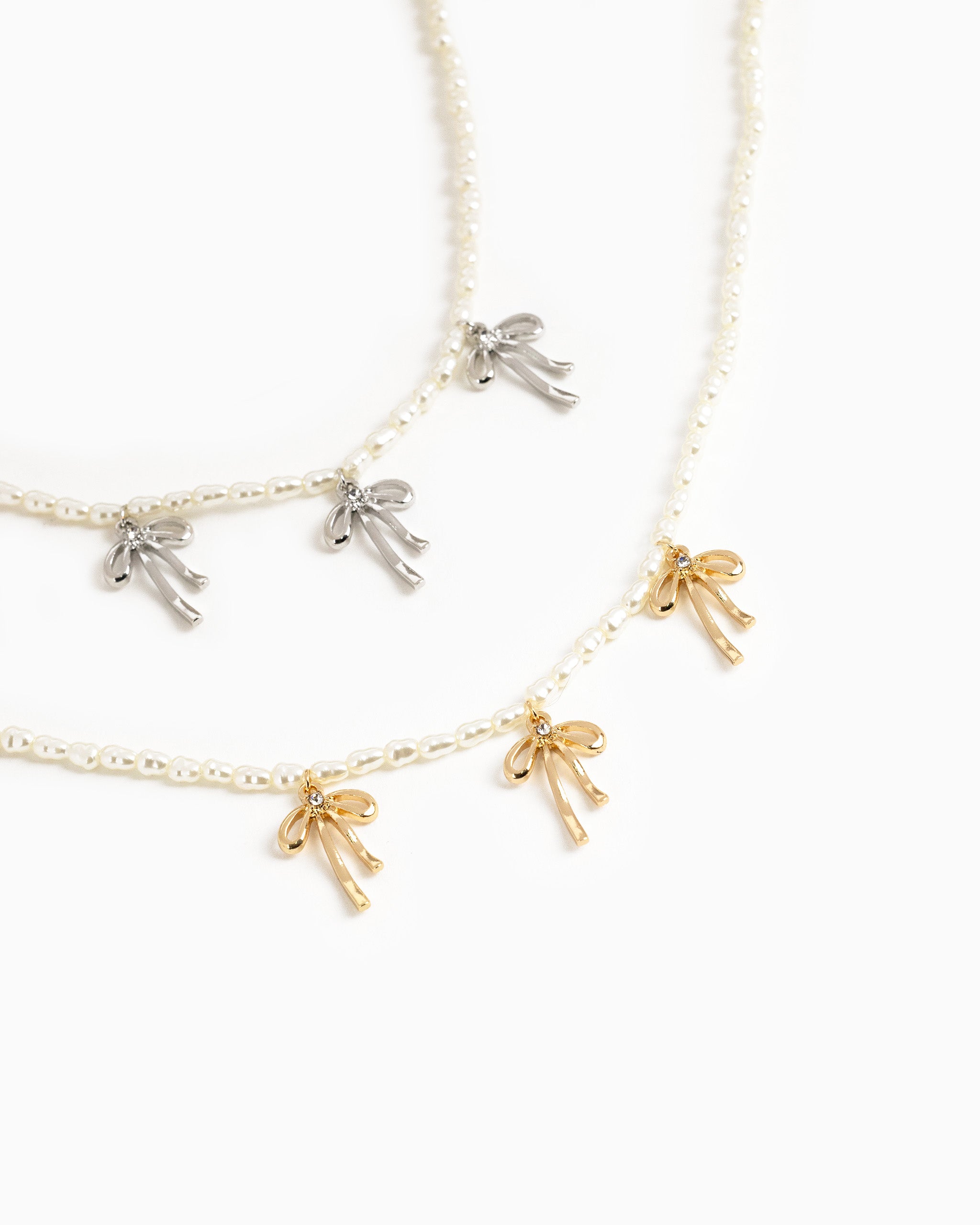 Metal Bow Station Pearl Chain Necklace