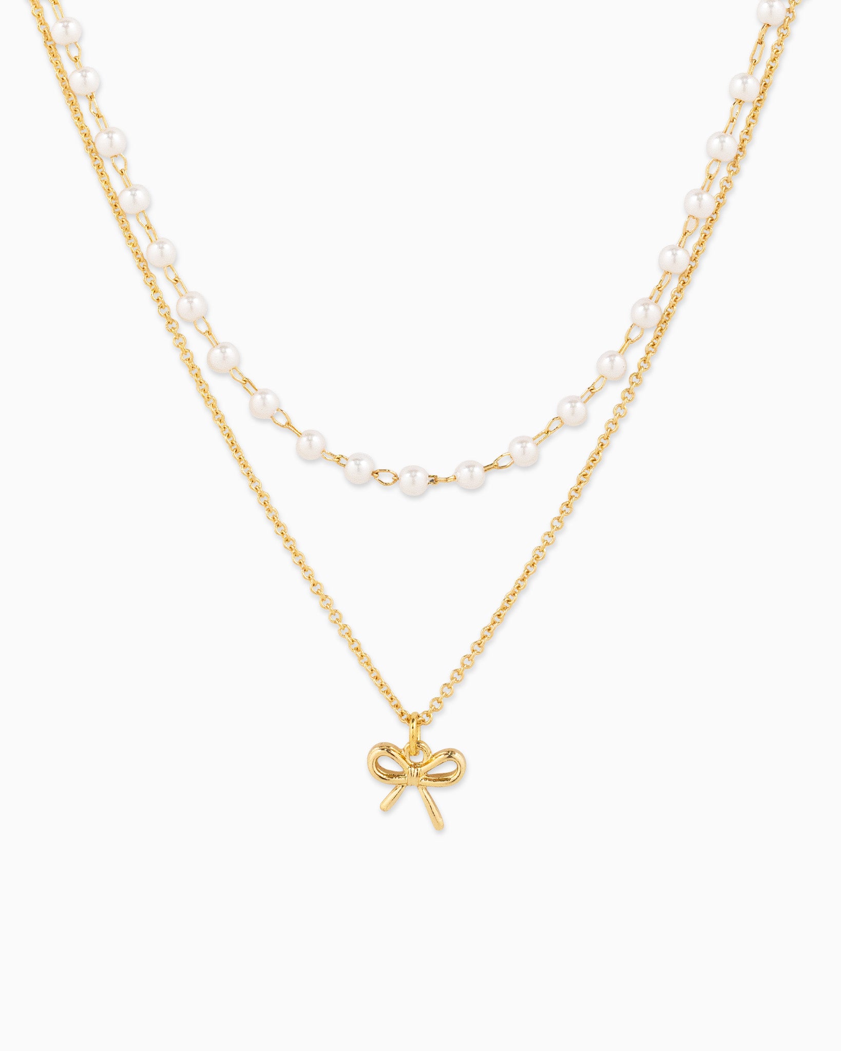 Double Layered Pearl Chain and Bow Pendant Necklace